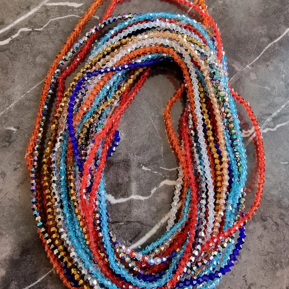 original Crystal Elastic waistbeads for women. crafted  to beautify your waistlines in vibrant  colour. *one size fit all*