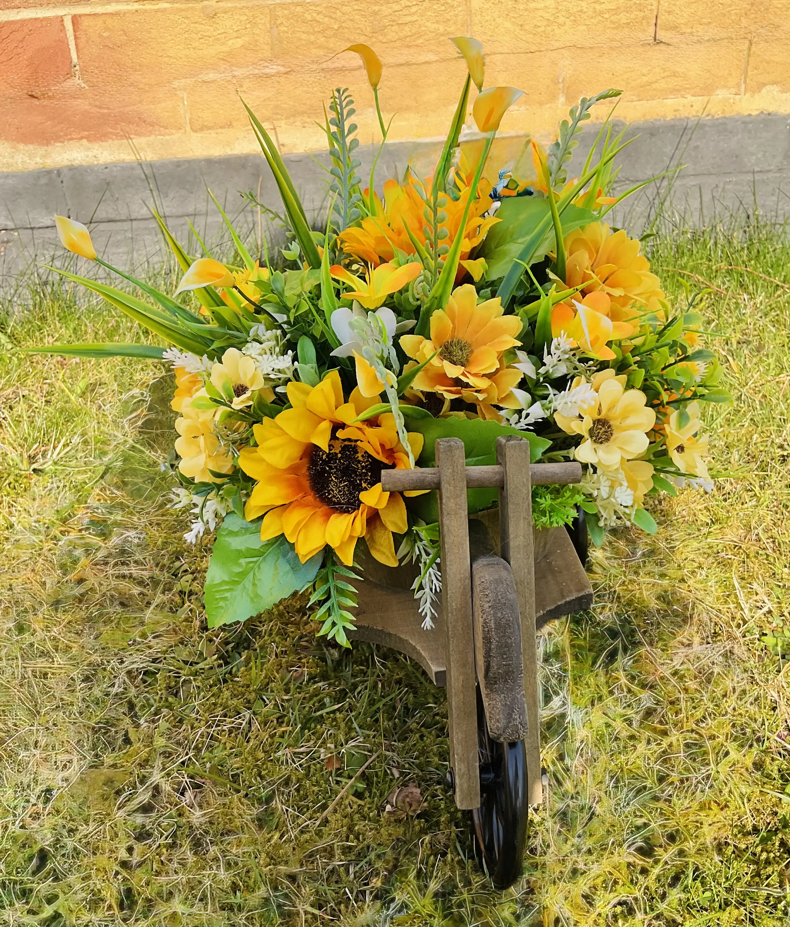 Esme’s Eternal blooms yellow artificial trike planter