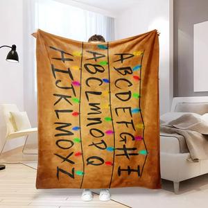 Comfortable, warm, and soft blankets, shawls, sofa throws, Christmas lights, and letters from Stranger Things.