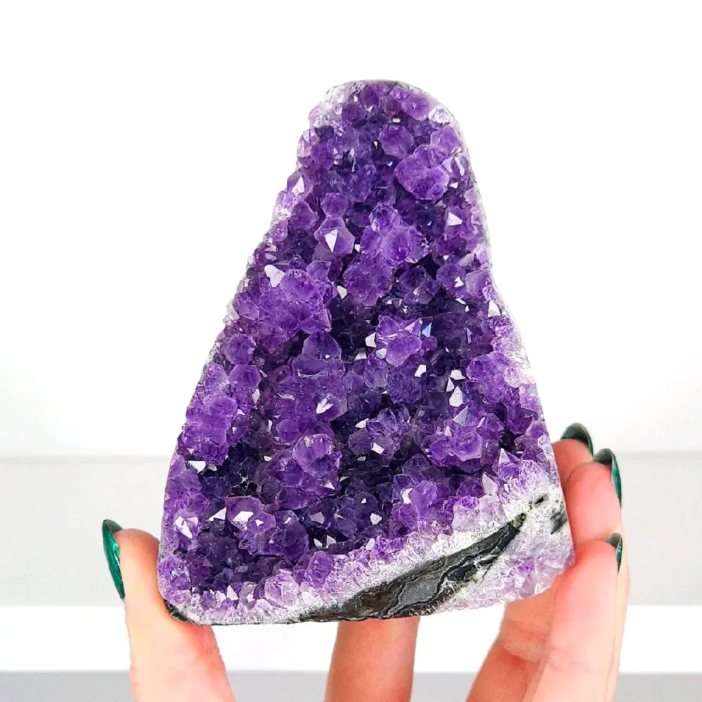 A Grade Amethyst Large Cut Base Cluster with flower formations