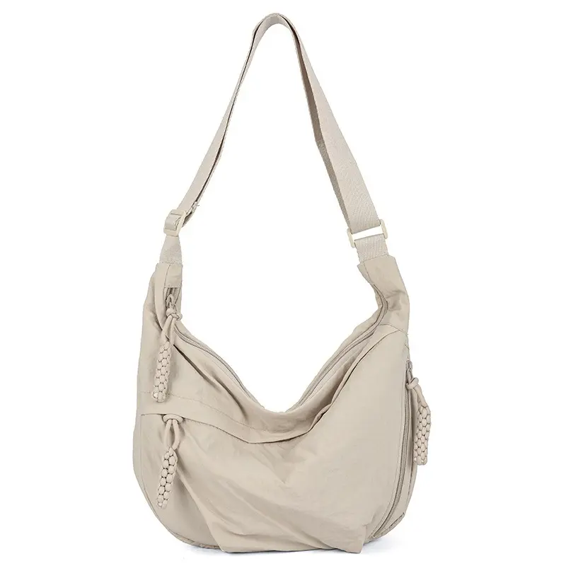 Sporty Oxford Crescent Crossbody Bag – Lightweight Nylon with Adjustable Strap, Multiple Pockets & Tassel Detail for Commute, School & Outdoor Use