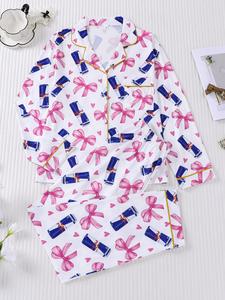 2-piece women's set with bow and heart design, long sleeve top, long pants with small pockets, comfortable, soft, skin-friendly, smooth fabric, elastic waistband, suitable for all seasons, casual loungewear, pajamas.