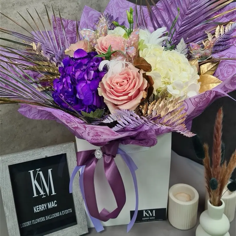 The Butterfly Effect . Hydrangea roses palms and butterflies fresh flowers